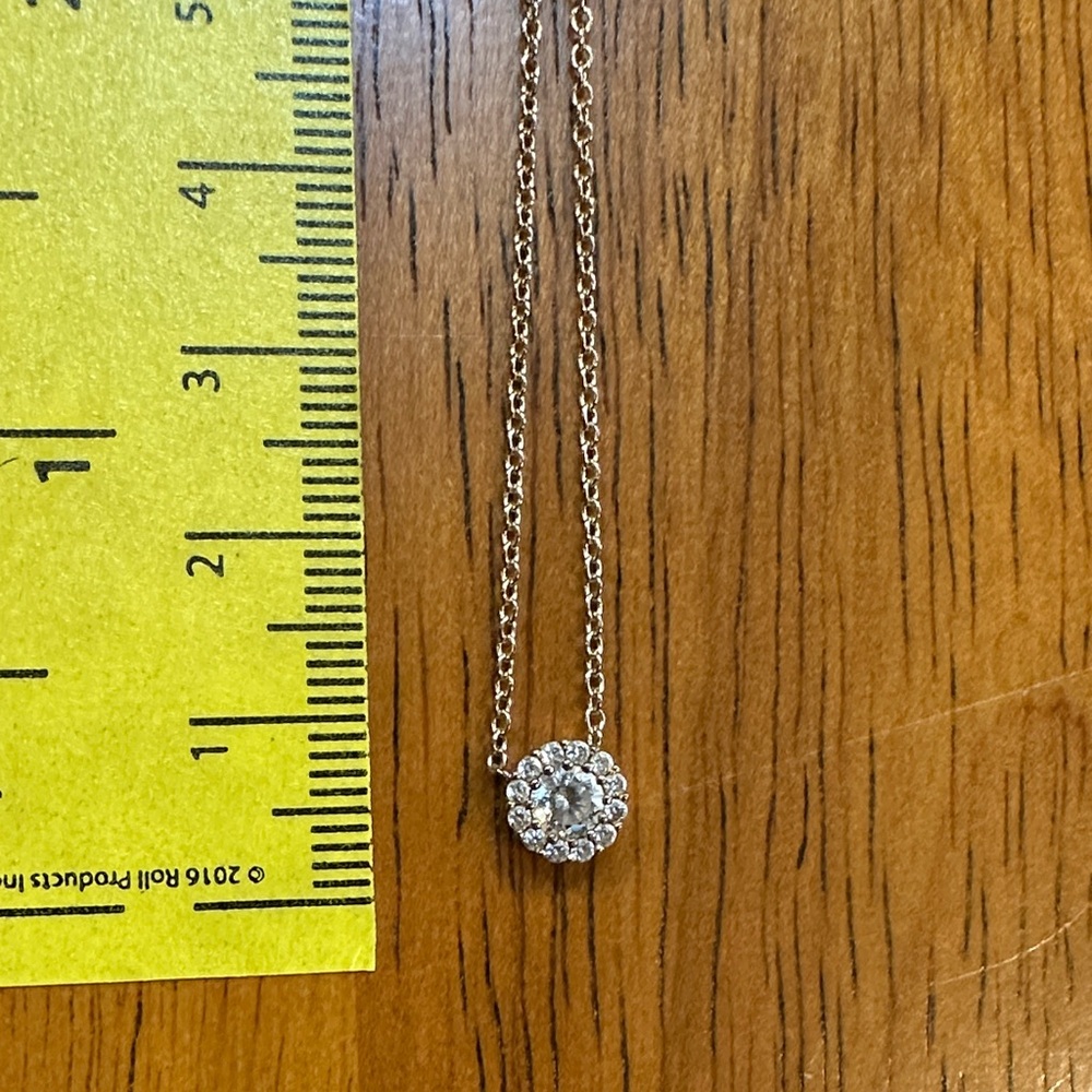 Dainty Gold over 925 and Cubic Zirconia Halo Pendant Necklace. Very 90’s style.